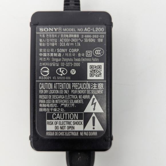 OEM Sony AC Adapter Charger DCR-SX44 E DCR-SX45 E DCR-SX50 E DCR-SX53 E AC-L200 - Picture 1 of 4